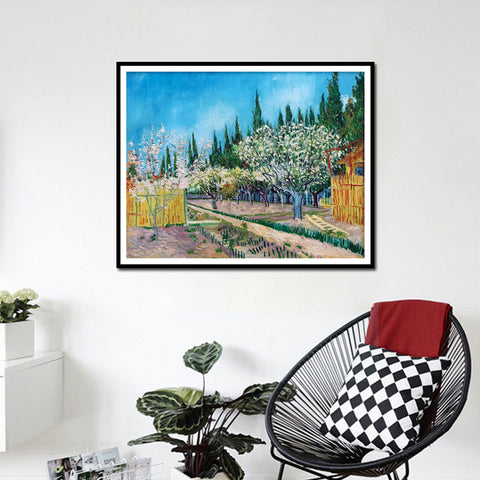 Framed Canvas Orchard in Blossom; Bordered by Cypresses by Vincent Van Gogh Wall Art