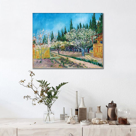 Framed Canvas Orchard in Blossom; Bordered by Cypresses by Vincent Van Gogh Wall Art