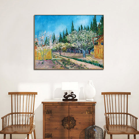 Framed Canvas Orchard in Blossom; Bordered by Cypresses by Vincent Van Gogh Wall Art